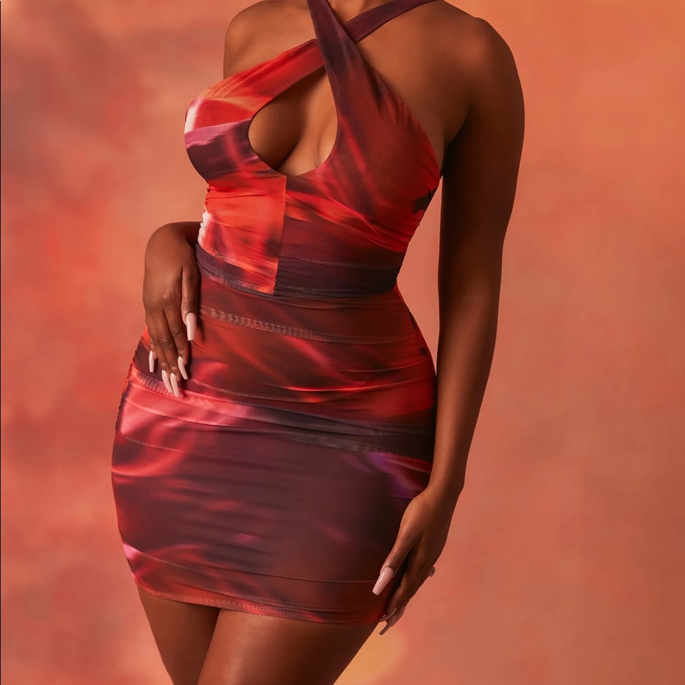OUT OF THIS WORLD 
CROSSOVER RUCHED MESH MINI DRESS IN ORANGE